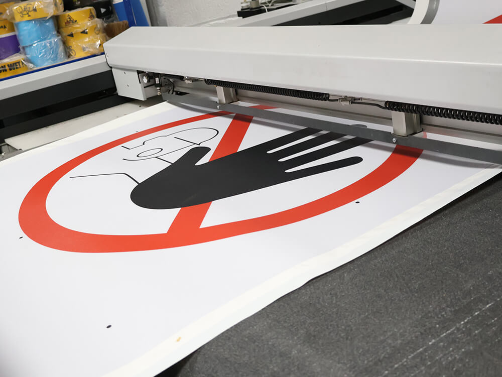 Attention Stop Custom Printed Floor Sign Being Cut on Toolless Cutting Machine 3
