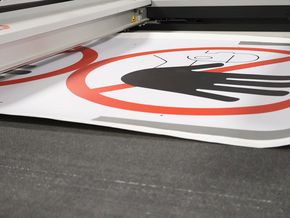 Attention Stop Custom Printed Floor Sign Being Cut on Toolless Cutting Machine 4