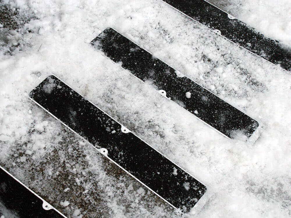 Preparing Slip Prevention for Winter Slip-Preventing Bolt Down Plates