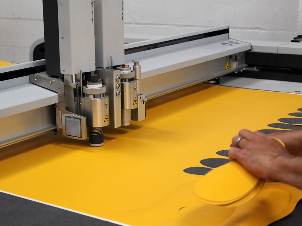 Zund Digital Die Cutting Machine Cutting Yellow Non Slip Material into Shoe Shapes 5