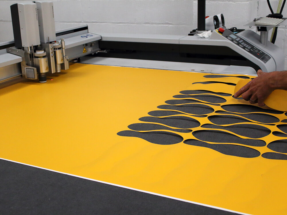 Zund Digital Die Cutting Machine Cutting Yellow Non Slip Material into Shoe Shapes 6