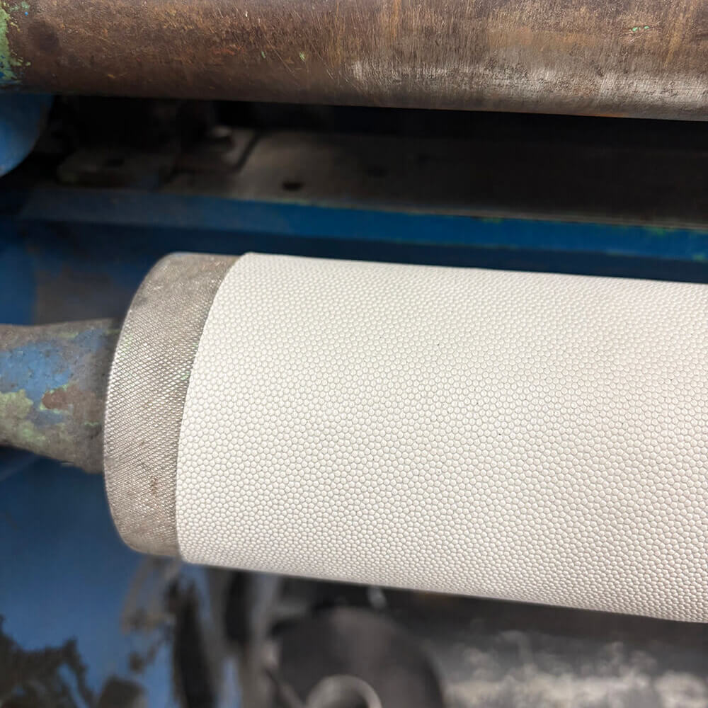 Roller grip tape on machine